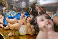 Restauración de figuras de  Niño Dios , oficio que se mantiene por generaciones